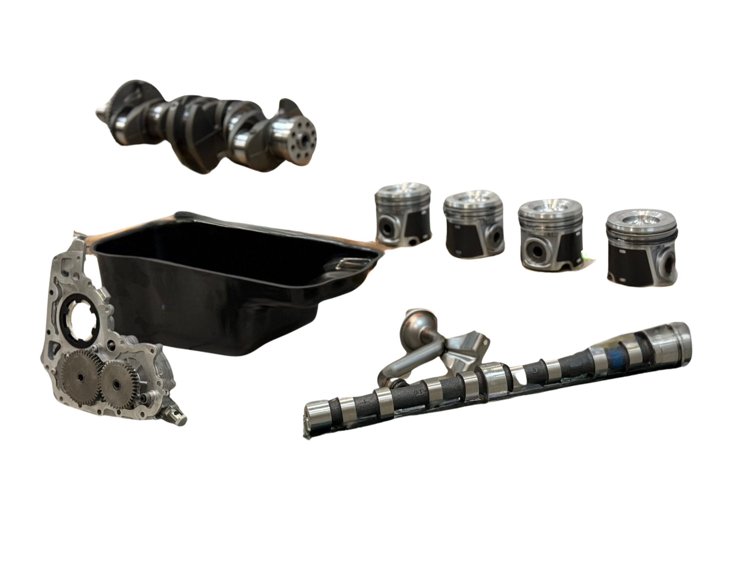 Zestaw części silnika spalinowego, w tym tłoki, miska olejowa, wałek rozrządu i elementy napędu rozrządu – kompletne podzespoły do naprawy lub modernizacji. Zestaw części silnika spalinowego, w tym tłoki, miska olejowa, wałek rozrządu i elementy napędu rozrządu – kompletne podzespoły do naprawy lub modernizacji.
